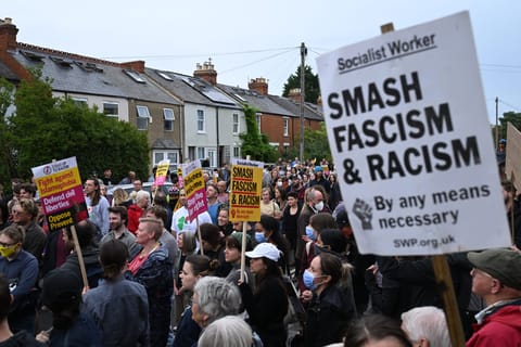 Thousands gather in anti-racist protests after warnings of more far-right violence in UK
