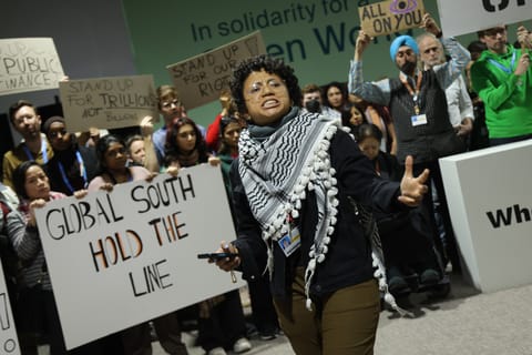 Climate summit ends with a long-fought deal — and a lot of anger